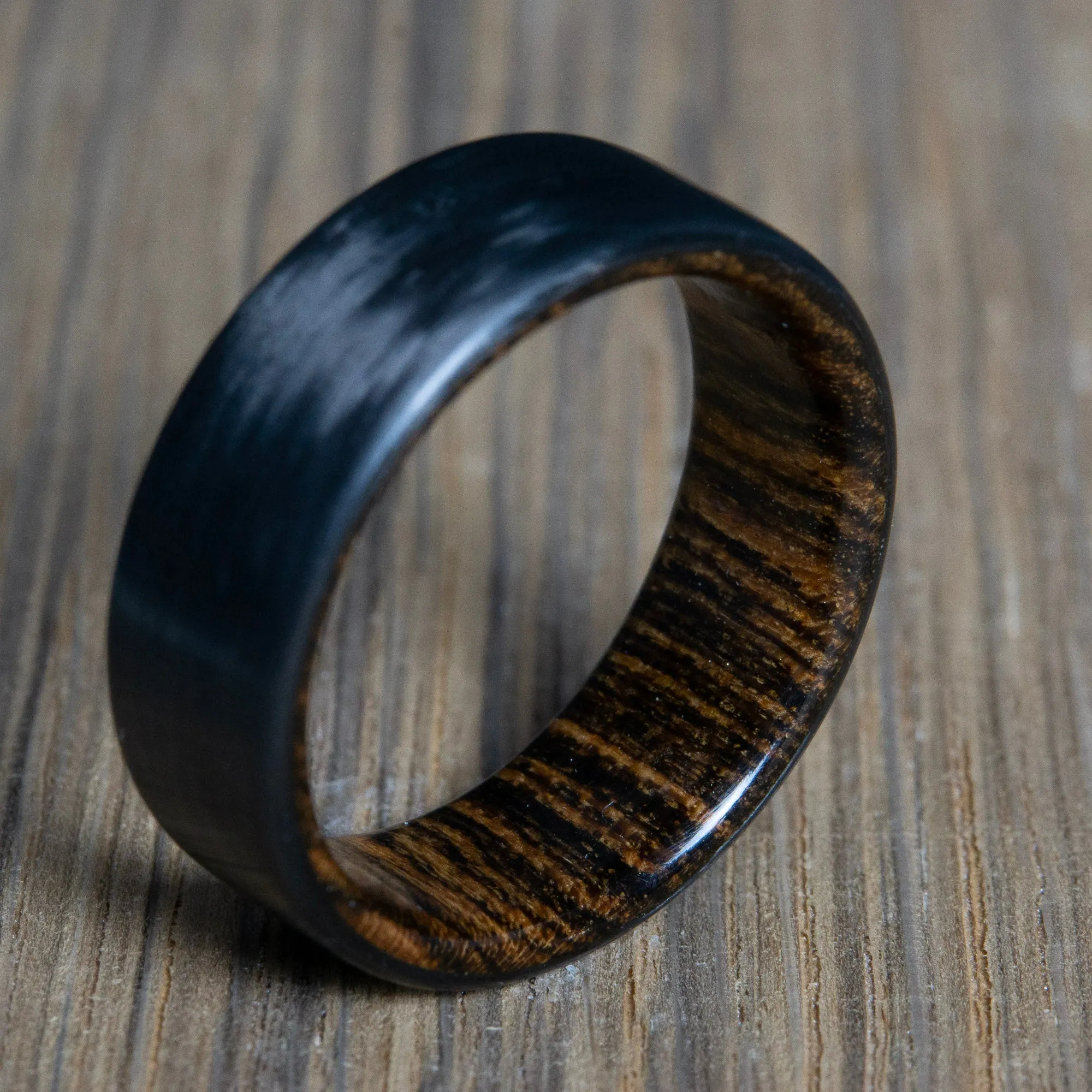"Bocote" Carbon fiber men's wedding band with bocote wood interior