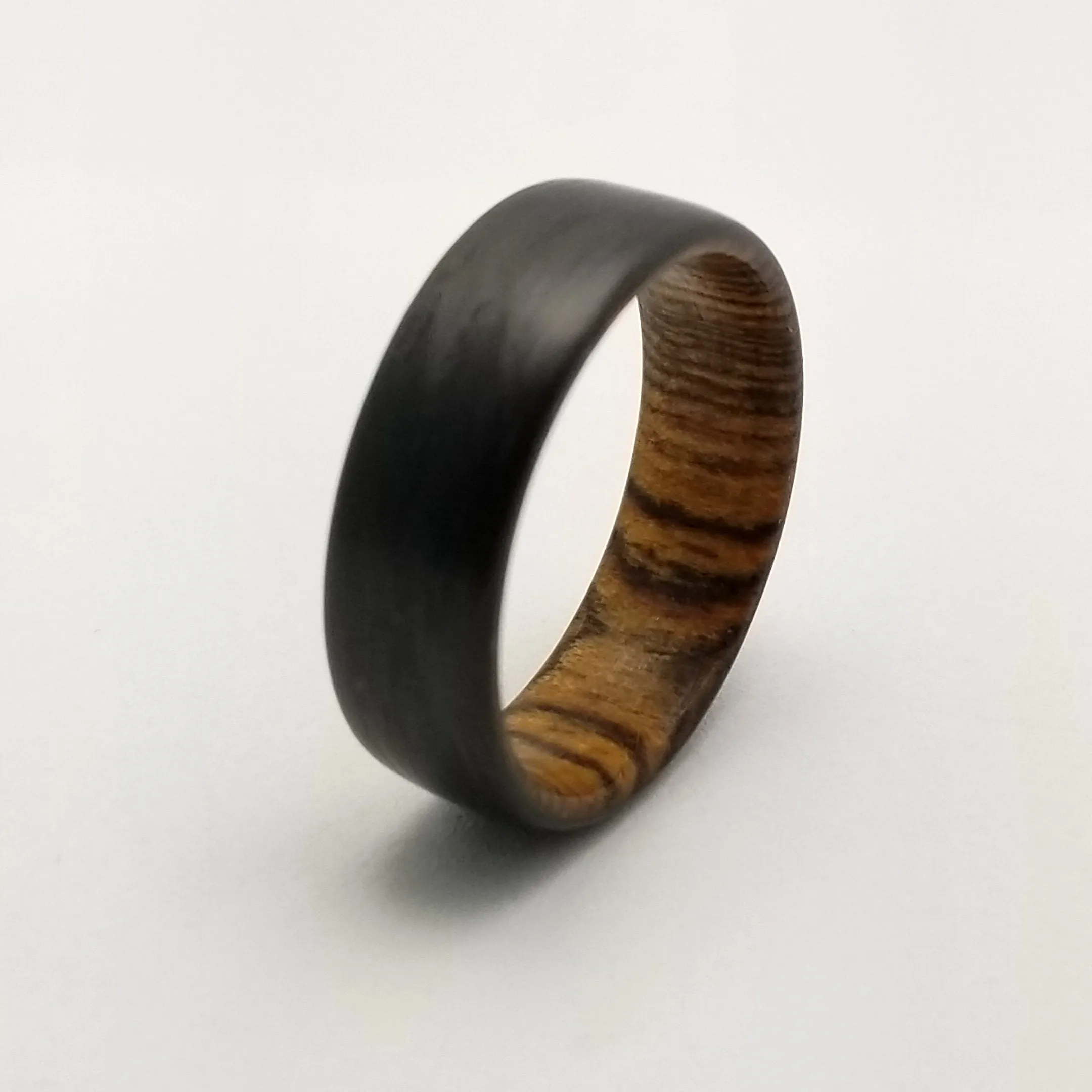 "Bocote" Carbon fiber men's wedding band with bocote wood interior